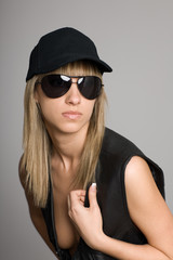 Fototapeta premium Stylish blonde girl in a sunglasses