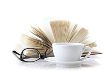 Cup of coffee and book