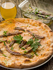 pizza napoli with anchovy and oregan- pizza napoletana