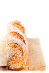 baguette on the wooden board