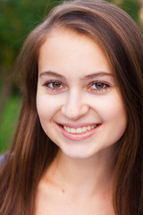 Fototapeta premium portrait of a beautiful young woman outdoor