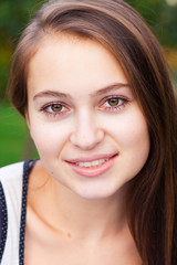 Fototapeta premium portrait of a beautiful young woman outdoor