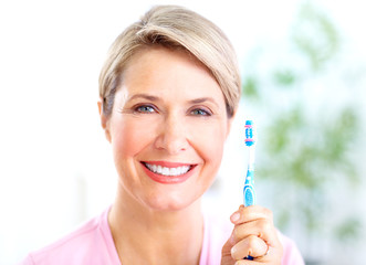 Woman with a  toothbrush