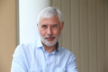 Portrait of smiling senior man