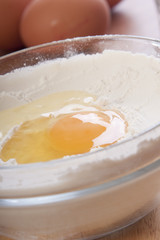 bowl with flour and an egg