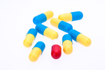 Capsules on white background