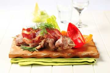 Roasted meat on wooden skewer