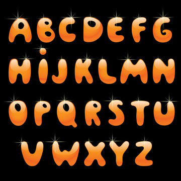 Glossy orange alphabet on black background