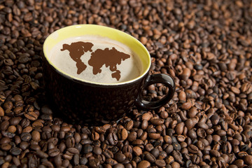 Coffee cup in coffee beans