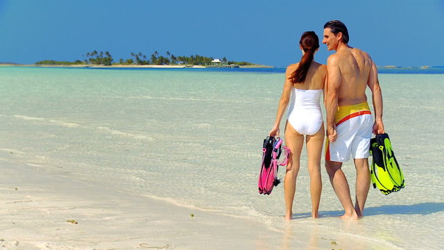 Young Couple Preparing to go Snorkeling