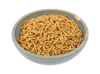 Fiber breakfast cereal in old chipped bowl