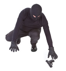 bandit is trying to recover his weapon
