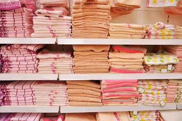 Bath towels on the shelves in the store