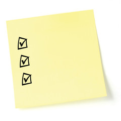 Yellow sticker checklist, blak tick marks and checkboxes, isola