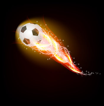 Football ball in fire on dark background
