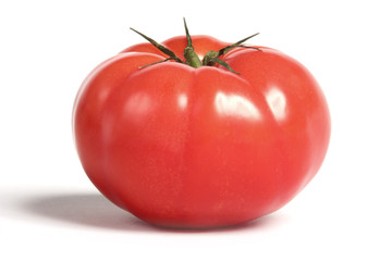 Juicy Organic Farmhouse Tomato, Isolated on white.