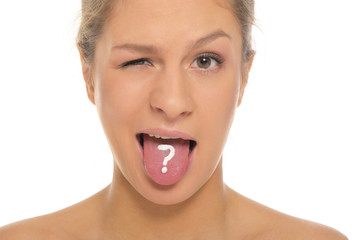 woman puts out tongue with drawn question mark