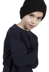 Portrait of a cute little boy with hat on. Isolated