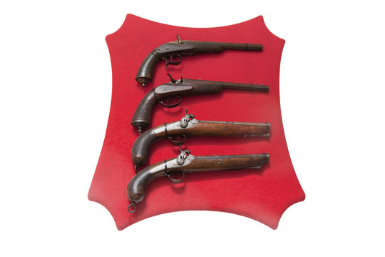 panoplia con pistolas