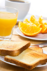 breakfast with toasts and orange