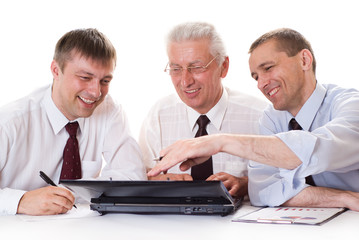 Three businessmen working