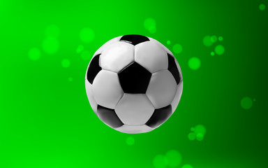 Fototapeta premium Soccer ball on green background