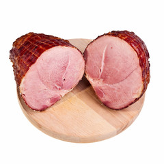 Two big pieces of smoked delicious ham on wooden board.