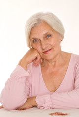 older woman on a white