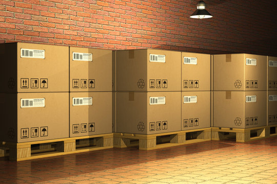 Cardboard boxes on shipping pallets in storage warehouse