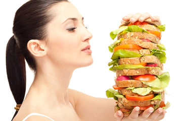 hungry woman looking huge sandwich