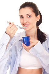 woman  with yogurt as breakfast or snack