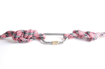Red-white-black alpinist rope connected by carabine.