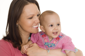 mom stands and holds the baby
