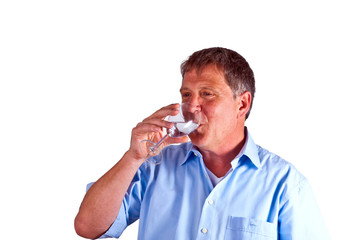 Fototapeta na wymiar thirsty man drinking out of a wine glass