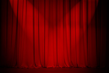 theatre red curtain with two lights cross