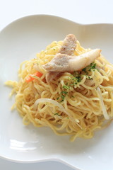 Asian cuisine, fried noodles with pork and vegetable