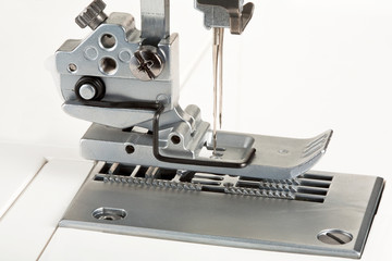 needles and foot of sewing machine