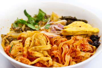 Traditional egg noodle with chicken curry