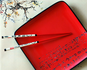 Japanese red dish and chopsticks