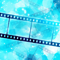 film strip on glowing blue background