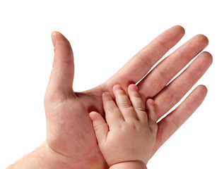 the hands of father and child