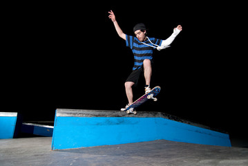 Skateboarder on a slide