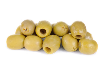 Some green pitted olives isolated on the white background