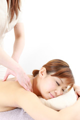Fototapeta na wymiar young japanese woman getting a massage