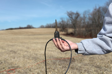 Man holds Sensor Geophones