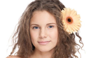 beautiful girl with perfect skin and flower