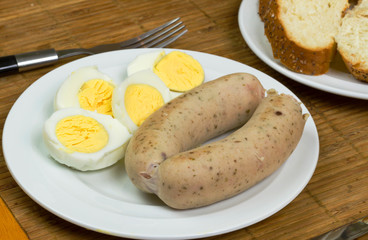 Eggs and white sausages for Easter breakfast