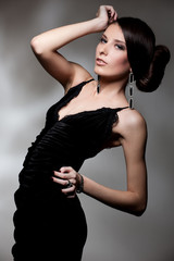 Fototapeta premium alluring woman in black dress