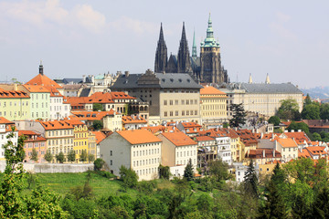 View on the spring Prague gothic Castle with the green Nature