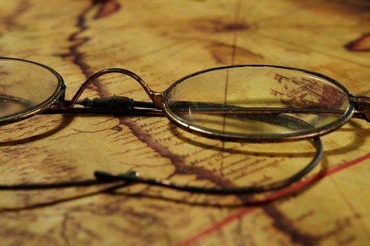 Glasses on the old map